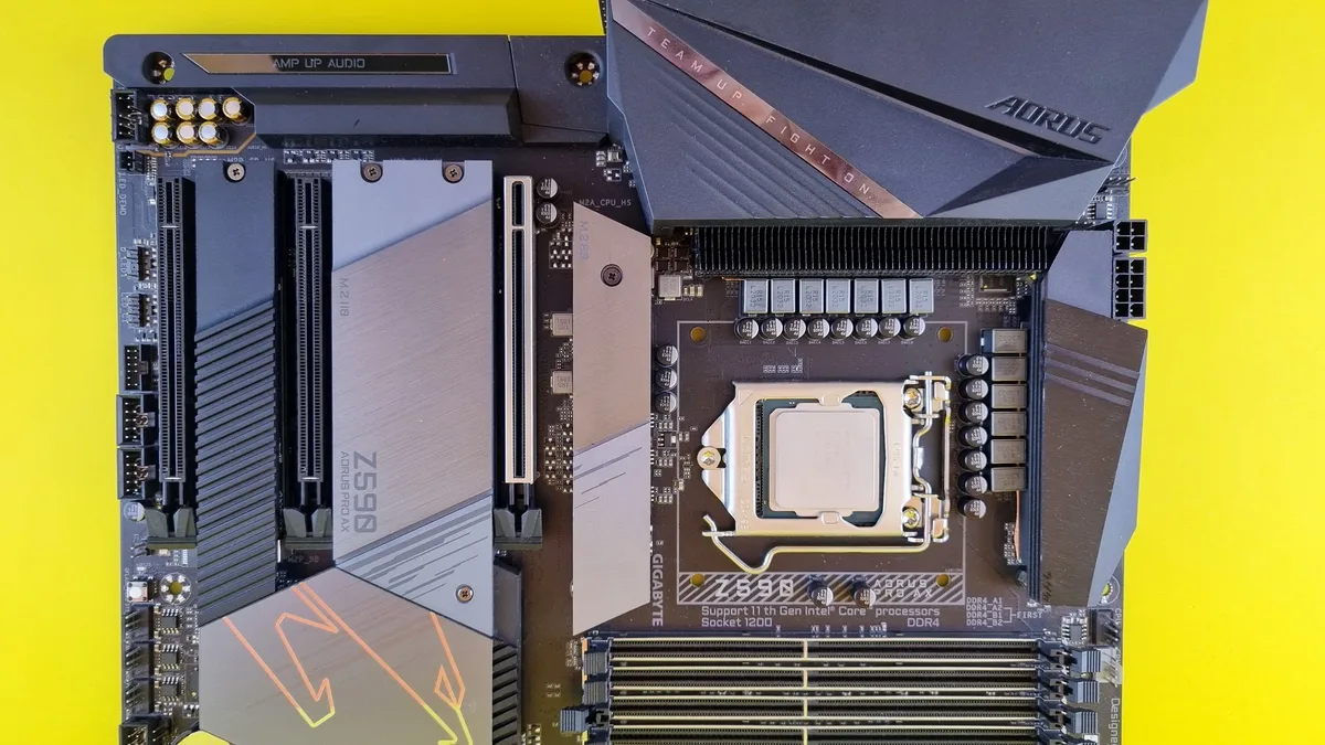 A motherboard with a CPU socket, RAM slots, and various other components.